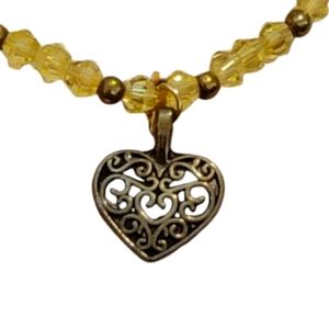 Gold tone Heart Pendant bracelet yelliw beads